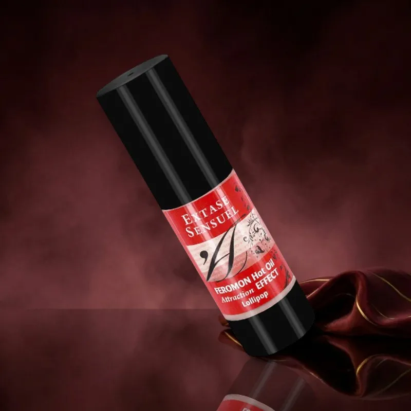 Extase Sensual Massageöl mit Wärmeeffekt und Lollipop Pheromonen - 30 ml